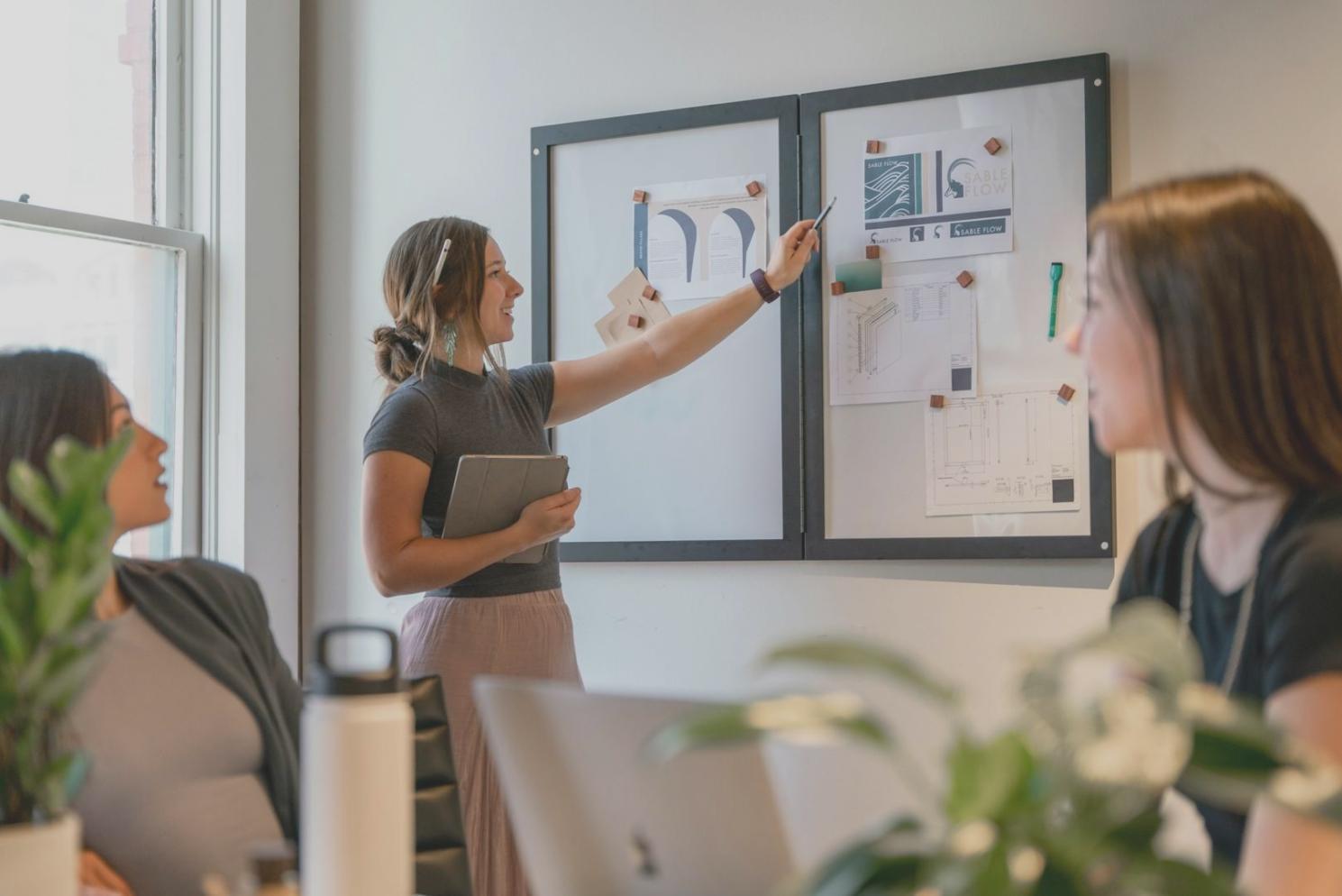 Person reviewing personal budget spreadsheet with income and expense tracking